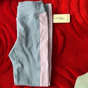 Year of ours leggings. Ribbed blue with lilac purple stripe down the side.